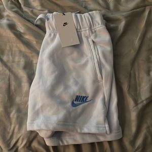 a light blue ish purple nike shorts never worn, gifted